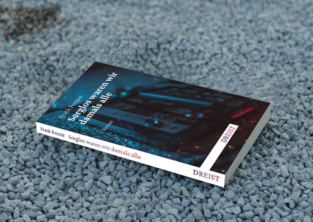 Foto von Buch "Sorglos waren wir damals alle" von Frank Forster auf einem Kiesfeld